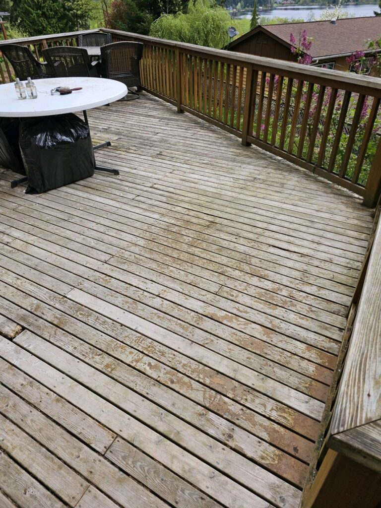 Before Renovation: Decrepit Deck in a Seattle Home's Backyard, Awaiting a Transformative Overhaul by Expert Remodeling Team